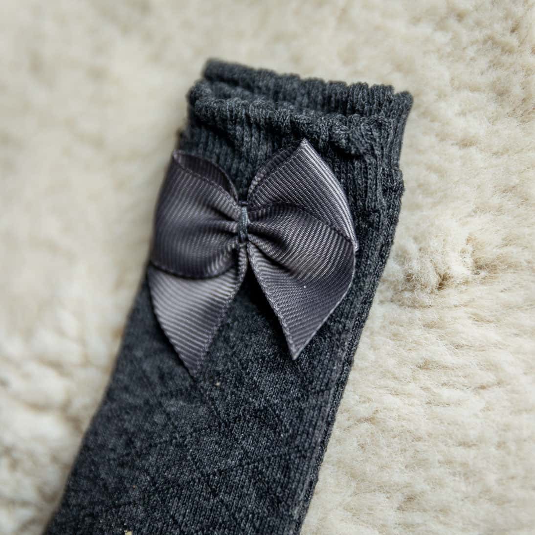 Kniekousen met strik - antraciet geruit