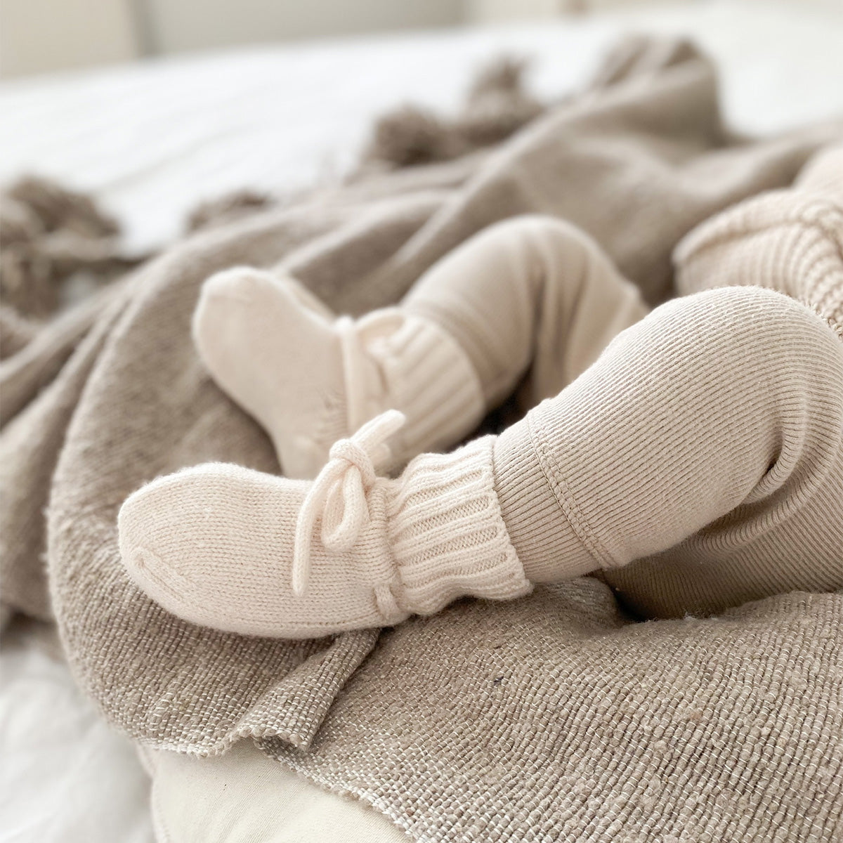 Babyslofjes van merinowol - offwhite