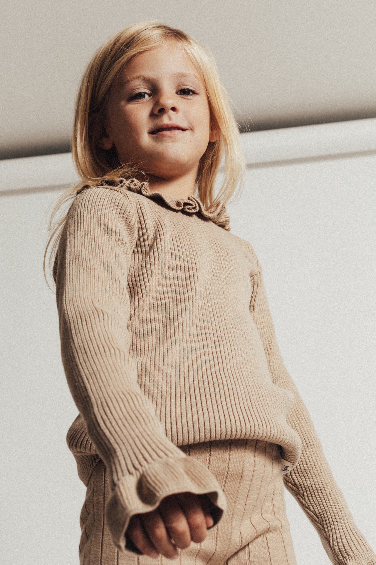 Baje Studio - knitted rib ruffle top Bow - peanut