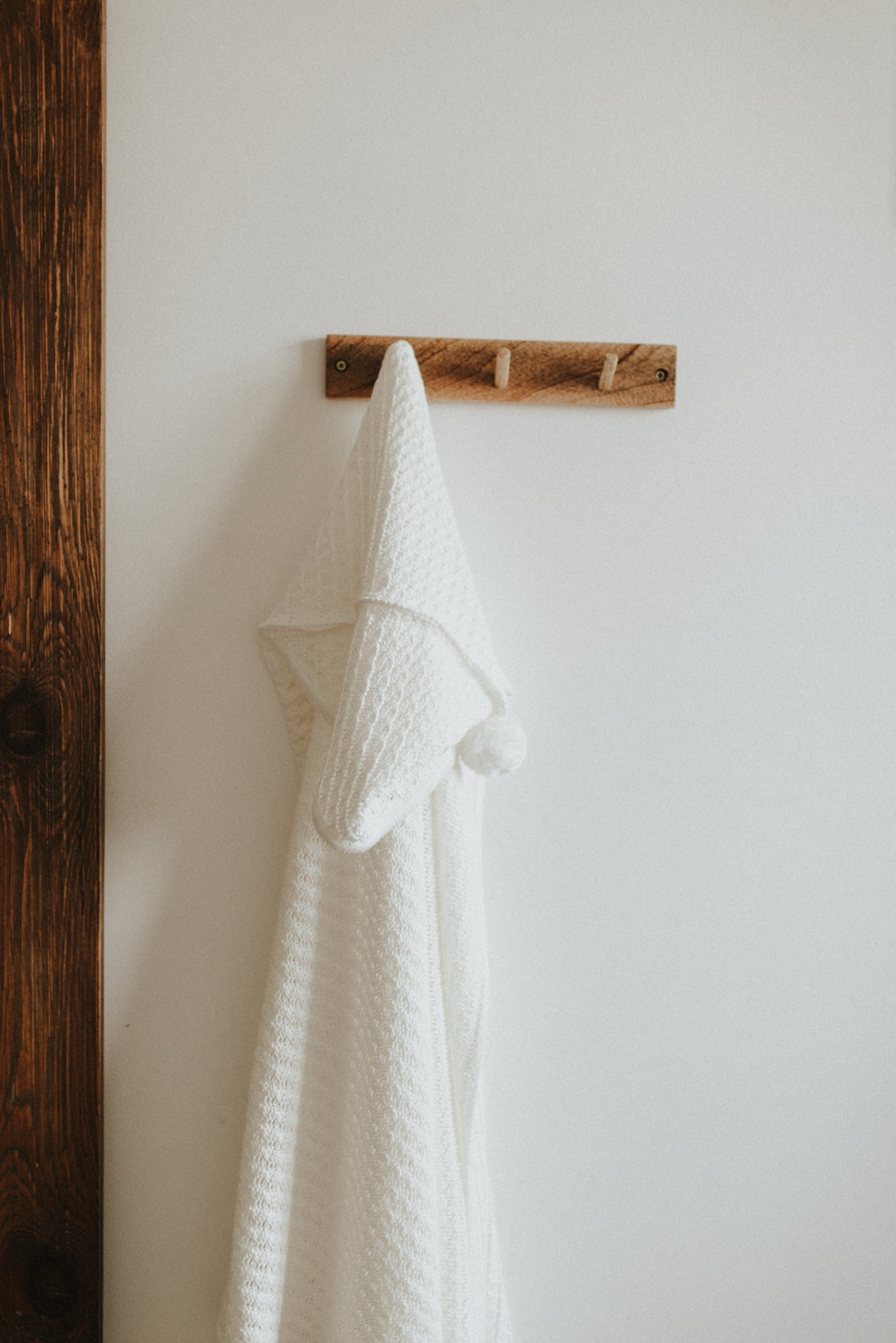Omslagdoek met pompom