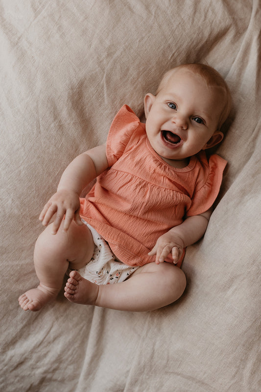 Riffle Amsterdam - jurk ruffle mouwtjes - koraal roze