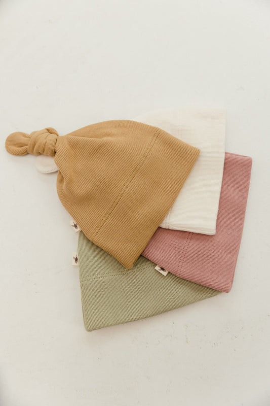 UAUA - knotted baby hat - camello