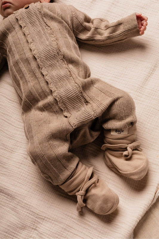 Baje Studio - knitted jumpsuit Cotes - peach almond