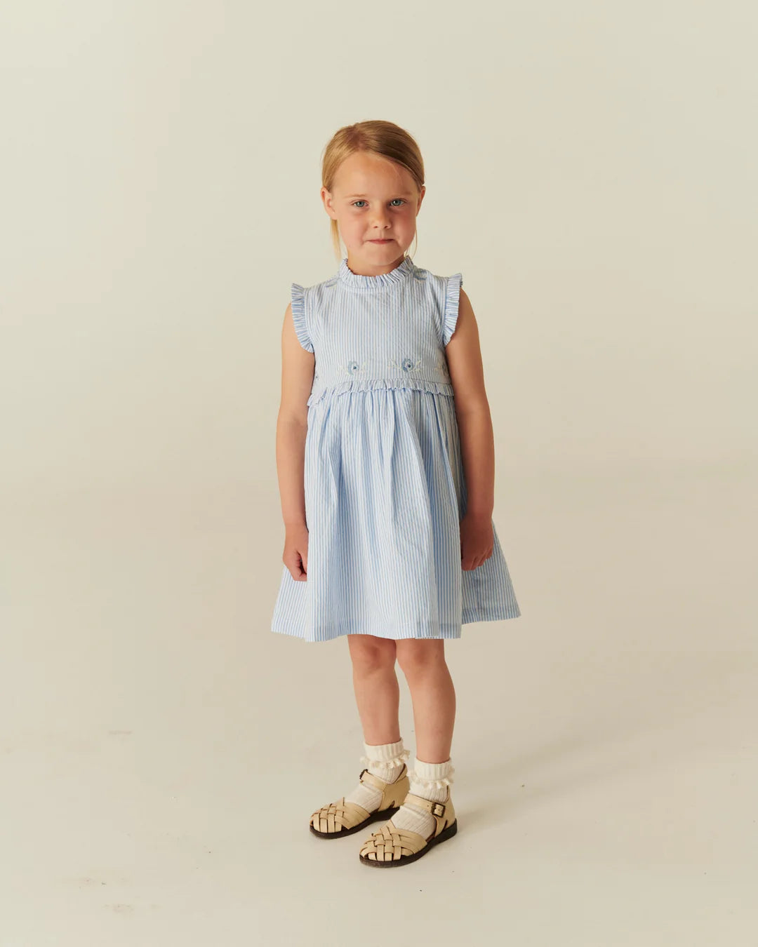 Copenhagen Colors - seersucker dress with ruffle - sky blue stripe
