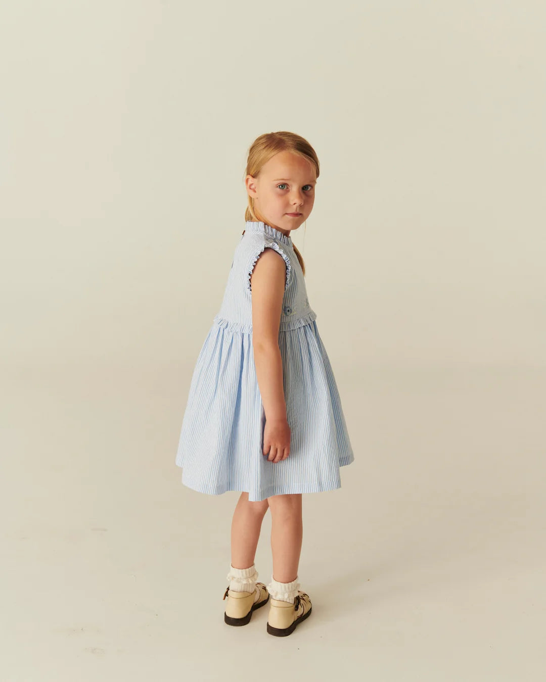 Copenhagen Colors - seersucker dress with ruffle - sky blue stripe